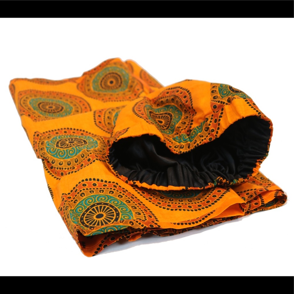 Orange SHORT-cap headwrap.